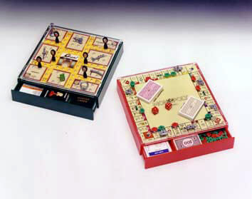 Cluedo Travel & Monopoly Travel games.  We fabricated the main box from acrylic.  The clear top playing surface was made from clear acrylic sheet with raised bosses with holes to locate the playing pieces.  The Cluedo players were machined in two halves and bonded together and shaped.  The Monopoly Hotels & Houses were hand cast resin and the playing pieces were profiled milled from a template 10 times larger and then hand carved.